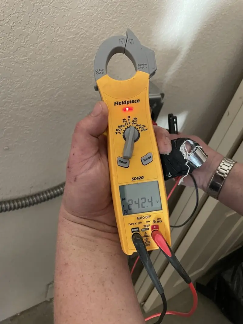 Voltage testing with clamp meter during Generator Installation in Vine Hill